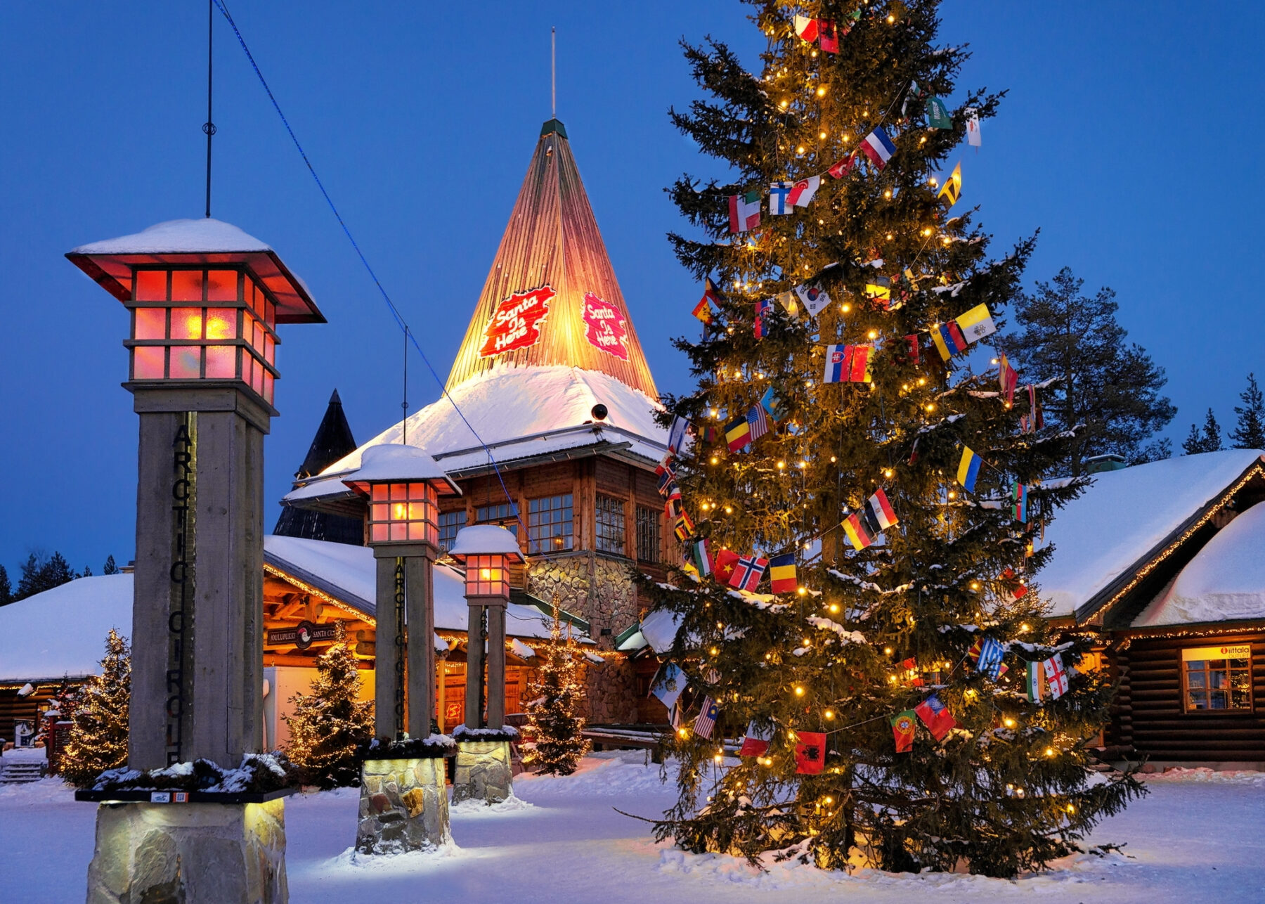 Santa Claus Village Lapland at night illuminated with light